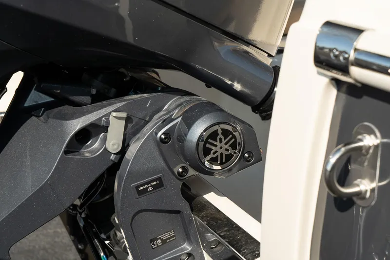 Slide: The Image of Close-up of 2025 Scout 195 Sportfish boat engine detail. - 13