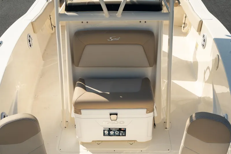Slide: The Image of 2025 Scout 195 Sportfish boat interior with seating and storage. - 27