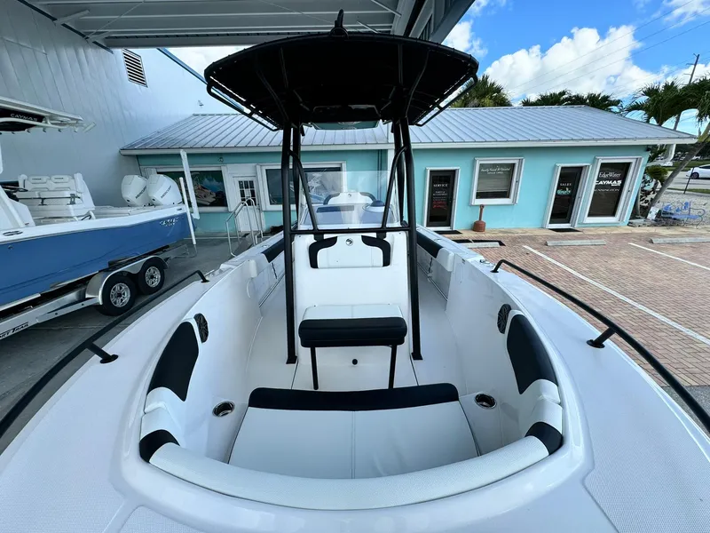 Slide: The Image of 2025 Edgewater 208 CC boat with sleek design and spacious seating. - 16