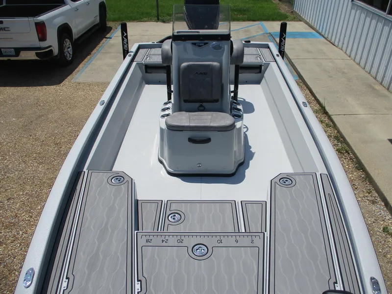 Slide: The Image of 2025 Avid 23 Mag boat interior with sleek design and spacious deck. - 8