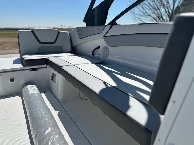Slide: The Image of 2025 Yamaha Boats AR220 interior seating with modern design and comfortable upholstery. - 10