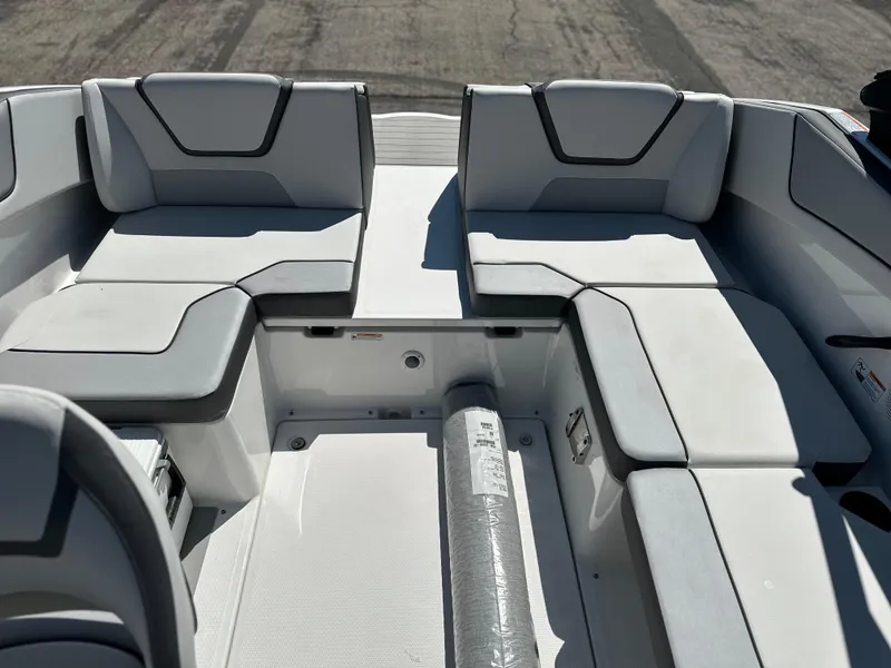 Slide: The Image of 2025 Yamaha Boats AR220 interior seating with modern design and comfortable upholstery. - 16