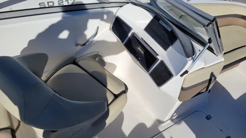 Slide: The Image of 2020 Hurricane SD 217 PROJECT boat interior with beige seating and control panel. - 11