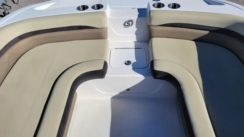 Slide: The Image of 2020 Hurricane SD 217 PROJECT boat interior with beige seating and cup holders. - 13