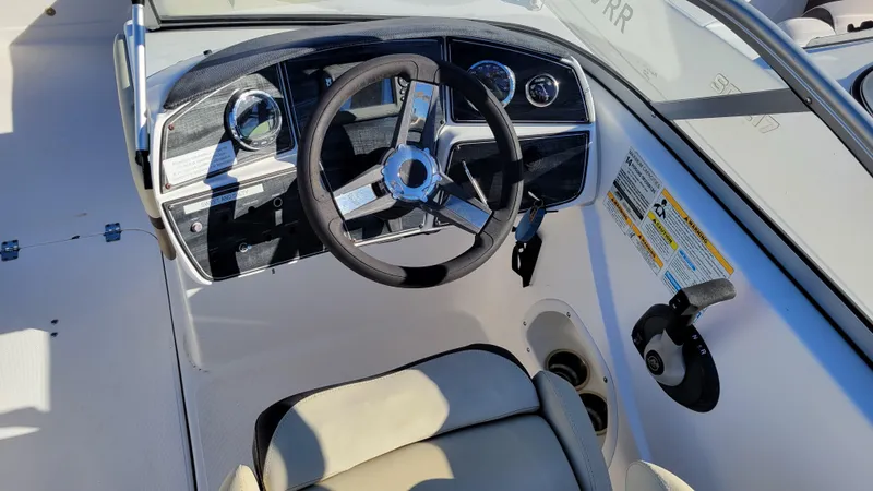 Slide: The Image of 2020 Hurricane SD 217 PROJECT boat dashboard with steering wheel and controls. - 17