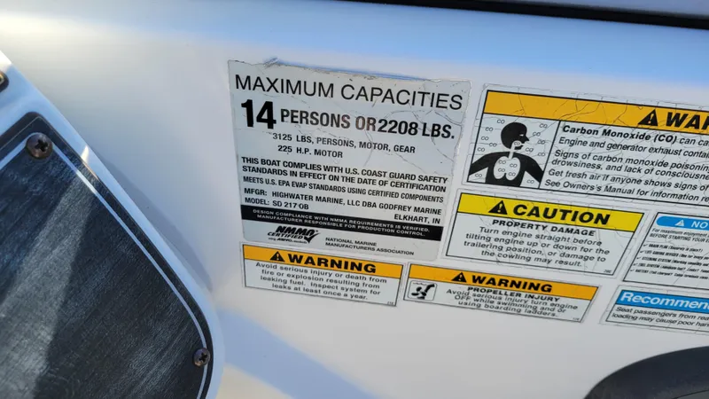 Slide: The Image of Capacity label on 2020 Hurricane SD 217 PROJECT boat, max 14 persons or 2208 lbs. - 18