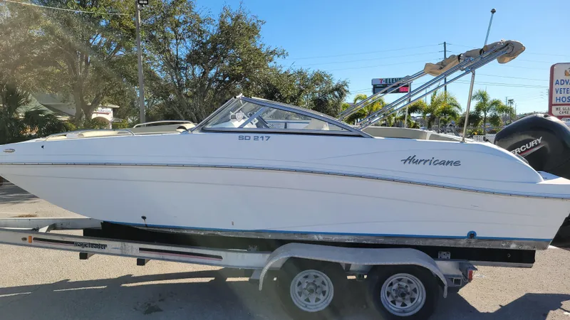 Slide: The Image of 2020 Hurricane SD 217 PROJECT boat on trailer, parked outdoors. - 5