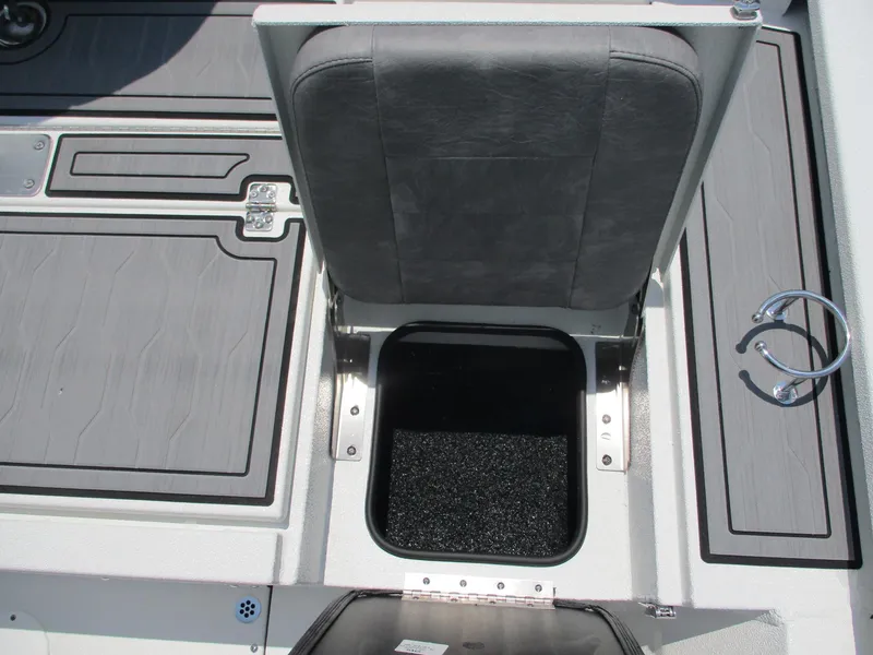 Slide: The Image of Avid 23 Fusion 2025 boat seat with storage compartment and cup holder. - 10