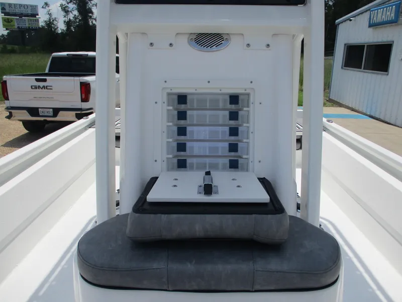 Slide: The Image of Avid 23 Fusion 2025 boat interior with storage compartments and seating. - 17