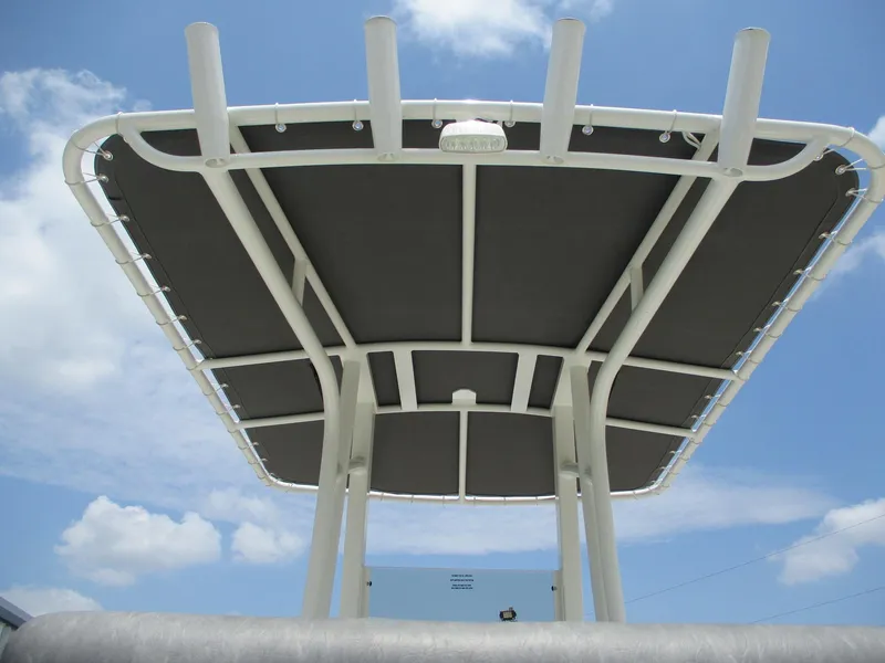 Slide: The Image of Avid 23 Fusion 2025 boat canopy against a clear blue sky. - 21