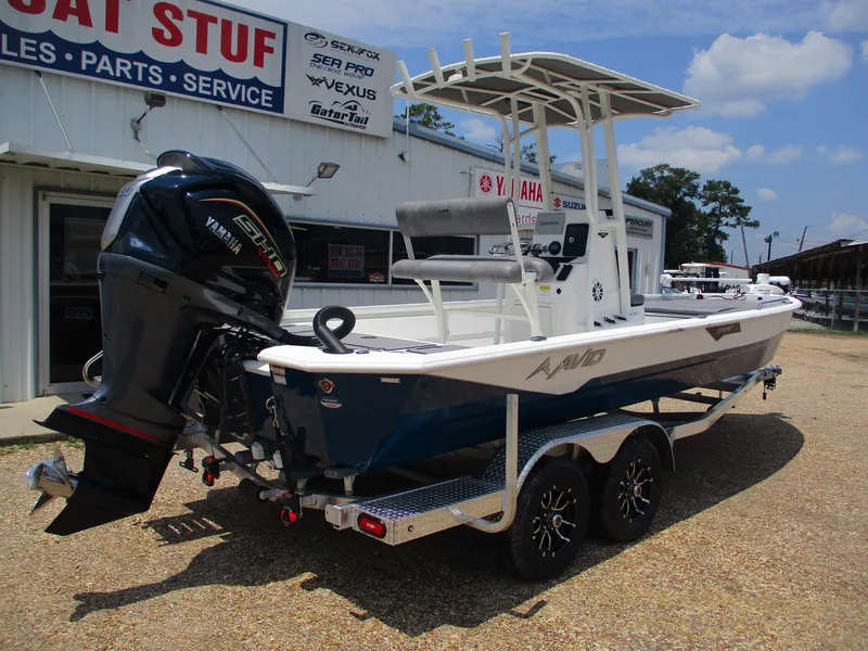 Slide: The Image of Avid 23 Fusion 2025 boat with Yamaha engine at dealership. - 6