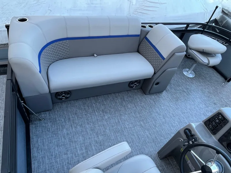 Slide: The Image of 2024 Qwest 814 CTR Fish L boat interior with gray seating and blue accents. - 3