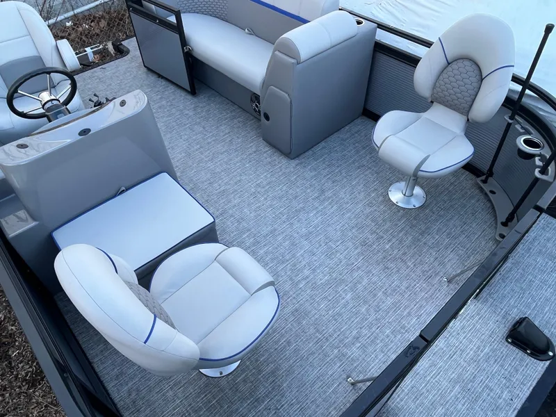 Slide: The Image of 2024 Qwest 814 CTR Fish L boat interior with gray seating and carpet. - 4