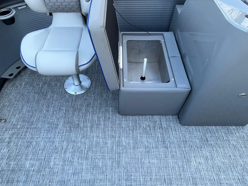 Slide: The Image of 2024 Qwest 814 CTR Fish L boat interior with seating and storage compartment. - 5