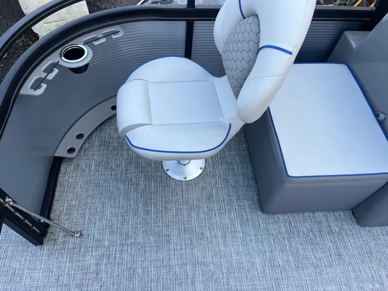 Slide: The Image of 2024 Qwest 814 CTR Fish L boat interior with swivel seat and cup holder. - 7