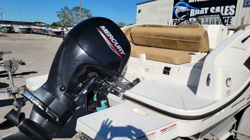 Slide: The Image of Bayliner DX2200 PROJECT 2020 boat with Mercury outboard motor at sales and service lot. - 3