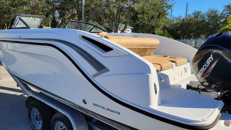 Slide: The Image of 2020 Bayliner DX2200 PROJECT boat with Mercury engine on trailer. - 5