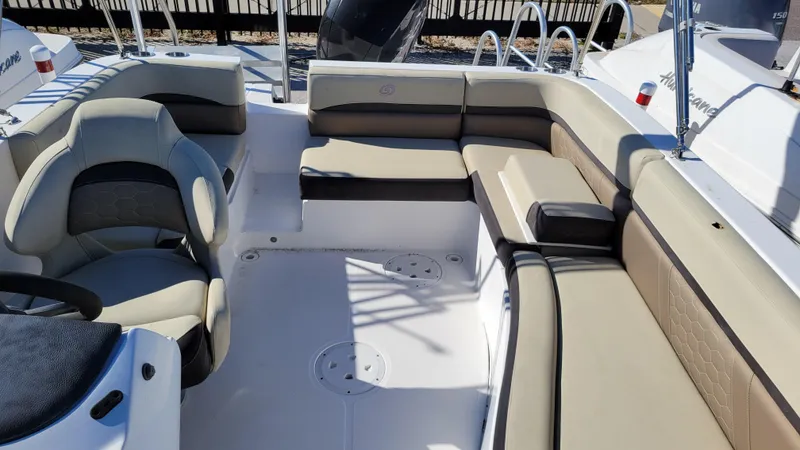Slide: The Image of 2020 Hurricane SS 192 PROJECT boat interior with beige seating and steering console. - 11