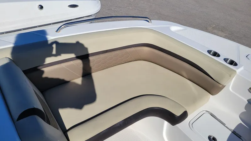 Slide: The Image of Hurricane SS 192 PROJECT 2020 boat interior with beige seating and cup holders. - 14