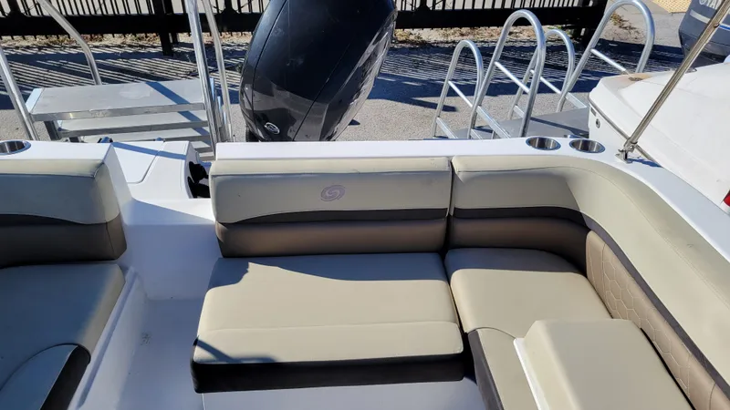 Slide: The Image of 2020 Hurricane SS 192 PROJECT boat interior with beige seating and cup holders. - 22