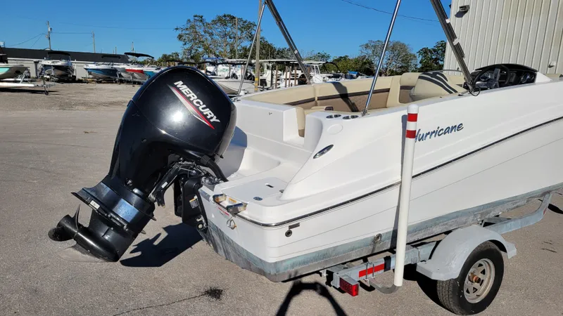Slide: The Image of Hurricane SS 192 PROJECT 2020 boat with Mercury outboard motor on trailer. - 3