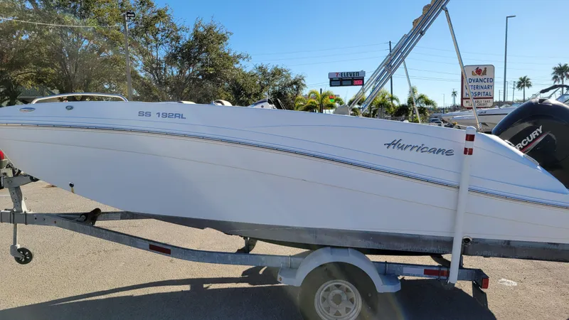 Slide: The Image of 2020 Hurricane SS 192 PROJECT boat on trailer, parked outdoors. - 6