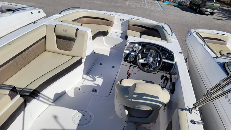 Slide: The Image of 2020 Hurricane SS 192 PROJECT boat interior with beige seating and steering console. - 9