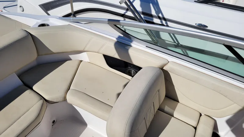 Slide: The Image of 2020 Regal 21 OBX PROJECT boat interior with beige seating and sleek design. - 12