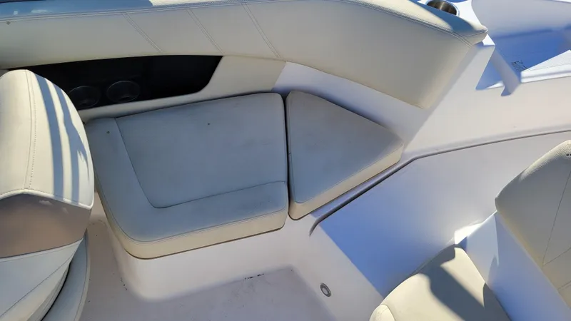 Slide: The Image of 2020 Regal 21 OBX PROJECT boat interior seating with beige upholstery. - 18