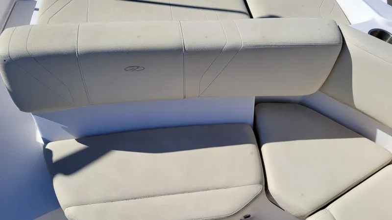 Slide: The Image of 2020 Regal 21 OBX PROJECT boat seating, beige upholstery, close-up view. - 20