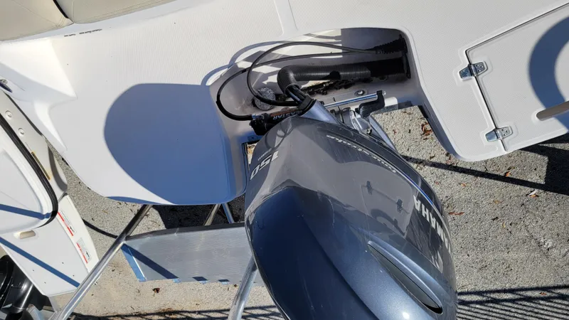 Slide: The Image of 2020 Regal 21 OBX PROJECT boat with outboard motor, close-up view. - 22