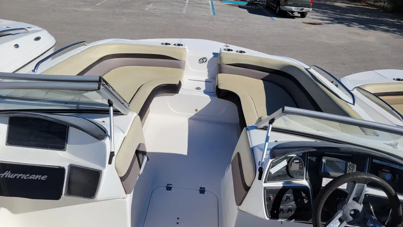 Slide: The Image of 2019 Hurricane SUNDECK 217 PROJECT boat interior with seating and dashboard. - 10
