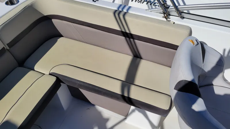 Slide: The Image of 2019 Hurricane SUNDECK 217 PROJECT boat interior with beige seating. - 11