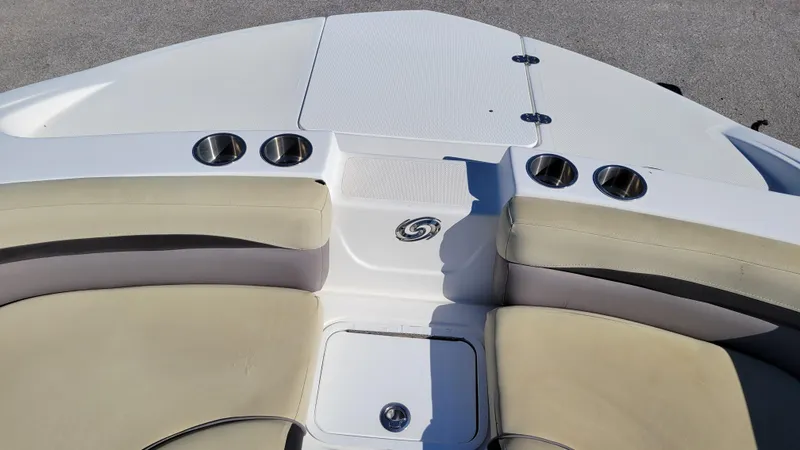 Slide: The Image of 2019 Hurricane SUNDECK 217 PROJECT boat interior with seating and cup holders. - 14