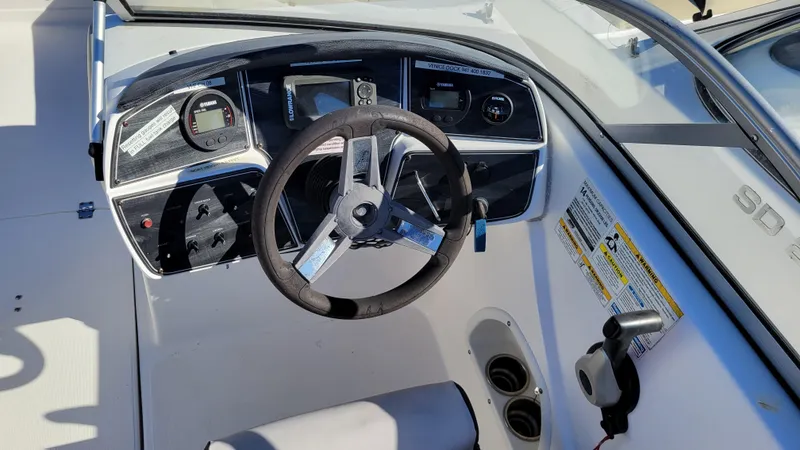 Slide: The Image of 2019 Hurricane SUNDECK 217 PROJECT boat dashboard with steering wheel and controls. - 17