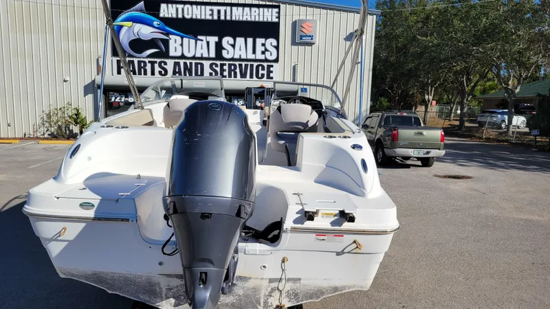 Slide: The Image of 2019 Hurricane SUNDECK 217 PROJECT boat at dealership, rear view. - 4