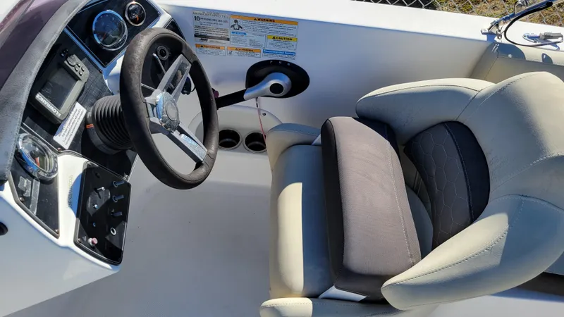 Slide: The Image of 2020 Hurricane SS 192RL PROJECT boat interior with steering wheel and cushioned seat. - 10