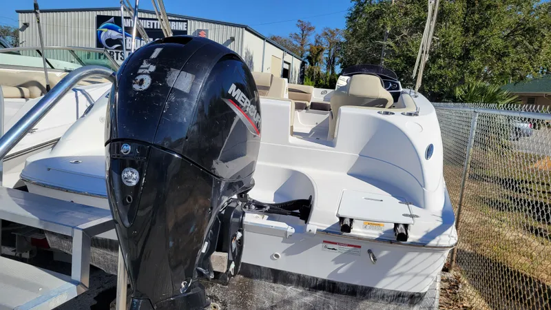 Slide: The Image of 2020 Hurricane SS 192RL PROJECT boat with Mercury outboard motor, parked outdoors. - 3