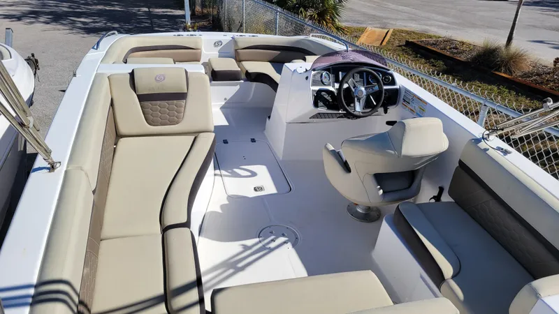 Slide: The Image of 2020 Hurricane SS 192RL PROJECT boat interior with beige seating and steering console. - 4