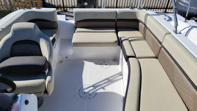 Slide: The Image of 2020 Hurricane SS 192RL PROJECT boat interior with beige seating and steering console. - 6