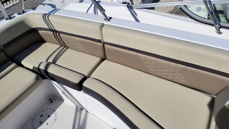 Slide: The Image of 2020 Hurricane SS 192RL PROJECT boat interior with beige seating and stainless steel railings. - 7