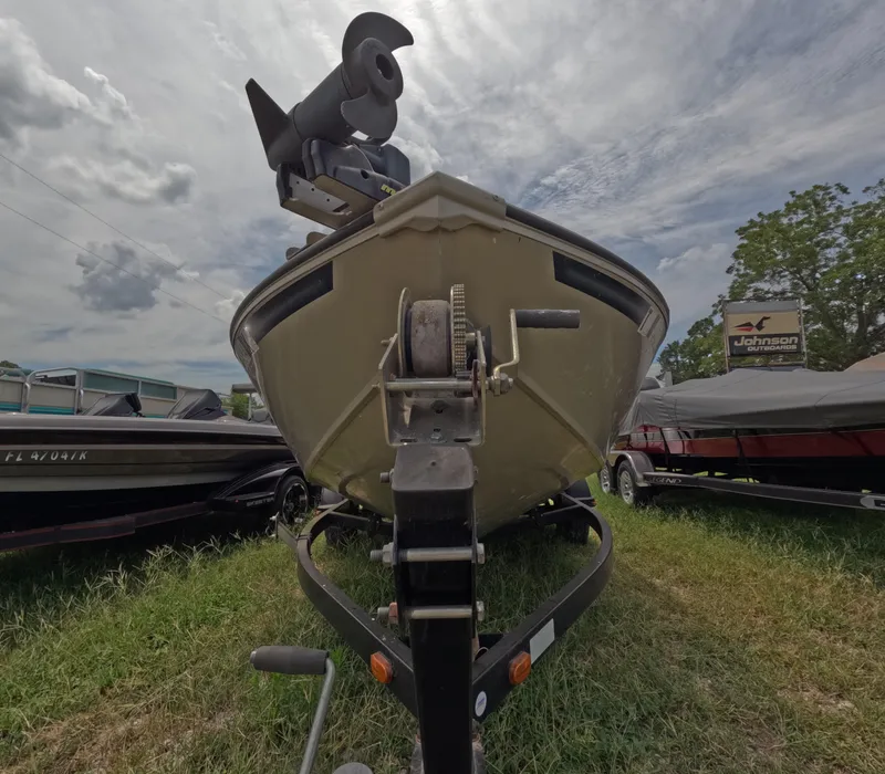 Slide: The Image of 2005 Lowe Fish & Ski FS175 boat on trailer, parked outdoors. - 3