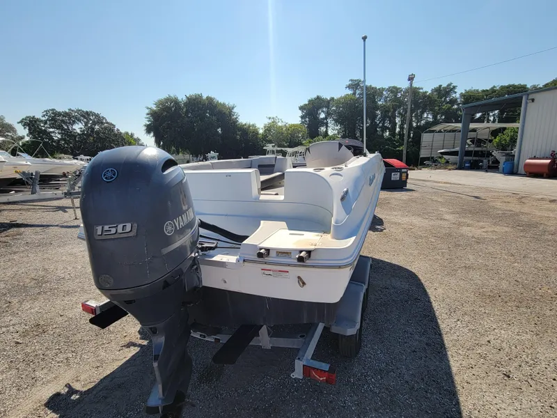 Slide: The Image of 2019 Hurricane SS 192 PROJECT boat with Yamaha 150 engine in outdoor storage. - 4
