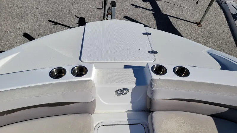 Slide: The Image of 2018 Hurricane SUNDECK 217 boat deck with cup holders and seating. - 16