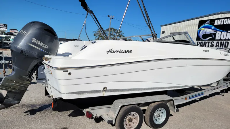 Slide: The Image of 2018 Hurricane SUNDECK 217 boat on trailer with Yamaha outboard motor. - 3