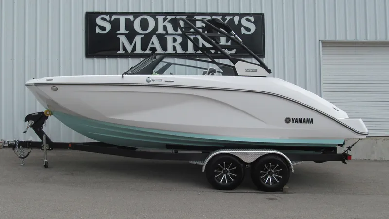 Slide: The Image of 2025 Yamaha Boats 222S on trailer at Stokley's Marine dealership. - 0