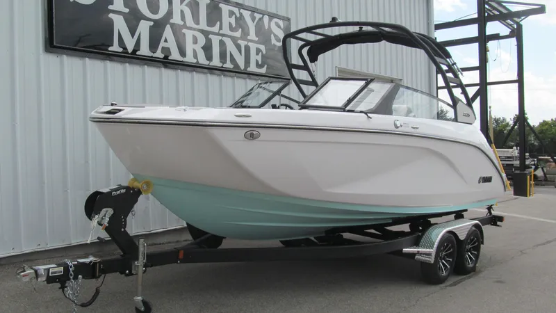 Slide: The Image of 2025 Yamaha Boats 222S on trailer at Stokley's Marine dealership. - 1