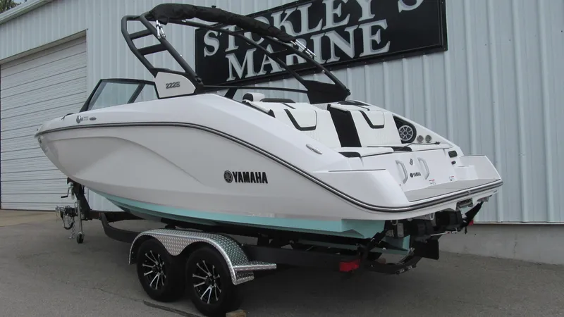 Slide: The Image of 2025 Yamaha Boats 222S on trailer at Stokley's Marine dealership. - 2