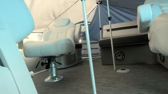 Slide: The Image of 2024 Godfrey Sweetwater 2286 SFL pontoon interior with plush seating and modern design. - 6