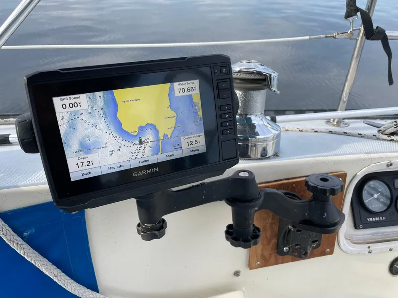 Slide: The Image of Garmin GPS on 1980 Lancer 36 sailboat, displaying nautical map and navigation data. - 18